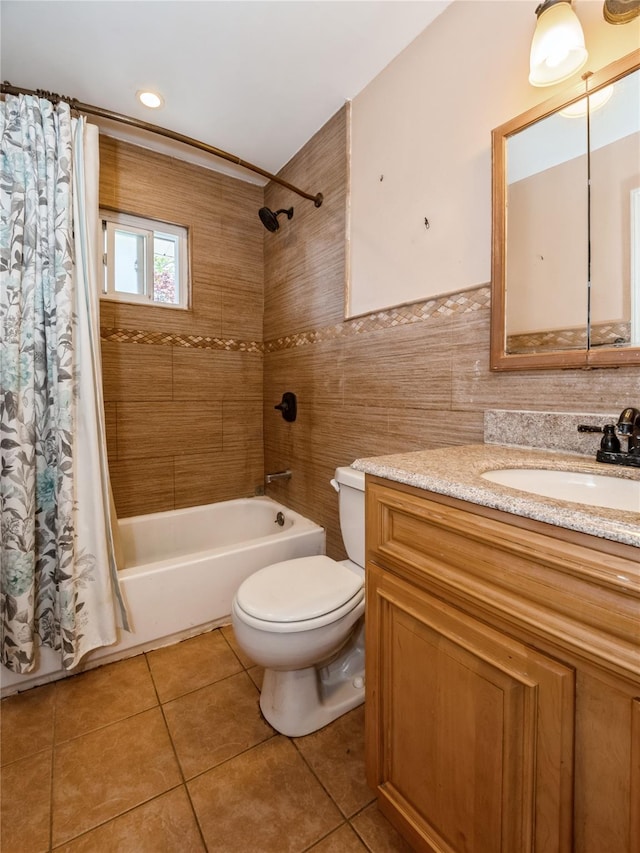 915 Derrick Adkins Ln, West Hempstead, NY 11552 - bathroom with toilet, shower / tub combo with curtain, tile patterned flooring, tile walls, and vanity