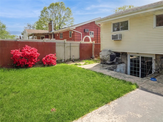 915 Derrick Adkins Ln, West Hempstead, NY 11552 - view of yard with an AC wall unit
