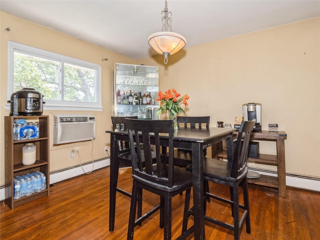 915 Derrick Adkins Ln, West Hempstead, NY 11552 - dining room featuring a baseboard heating unit, an AC wall unit, and wood finished floors