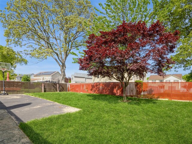 915 Derrick Adkins Ln, West Hempstead, NY 11552 - view of yard featuring a patio area