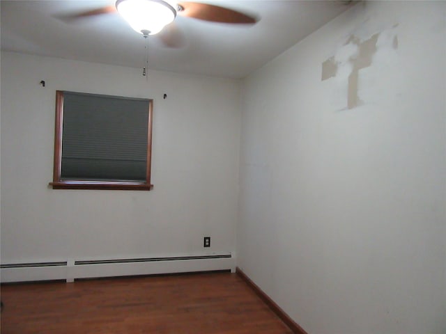 29 Beattie Rd, Washingtonville, NY 10992 - empty room featuring a ceiling fan, a baseboard heating unit, and wood finished floors