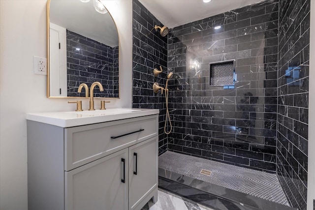 64 Jane Ct, Westbury, NY 11590 - full bathroom featuring vanity, marble finish floor, and a tile shower