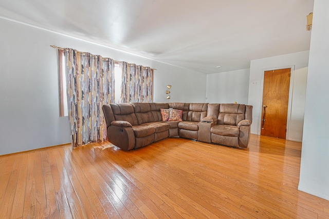 97 Arlington Ave, Valley Stream, NY 11580 - living area featuring light wood-style floors and baseboards