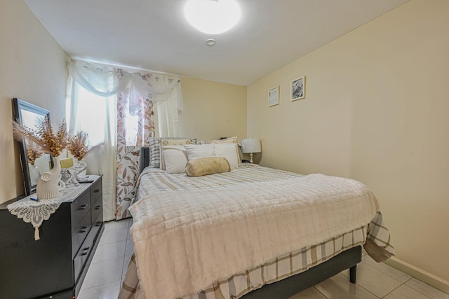 97 Arlington Ave, Valley Stream, NY 11580 - bedroom featuring light tile patterned floors and baseboards