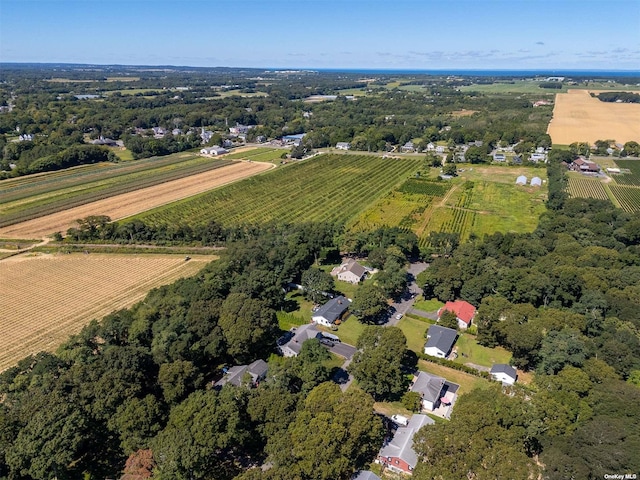 birds eye view of property with a rural view