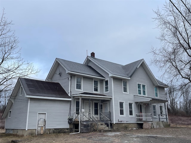 156 Greenville Tpke, Middletown, NY 10940 - view of front of home featuring a porch, roof with shingles, and a chimney