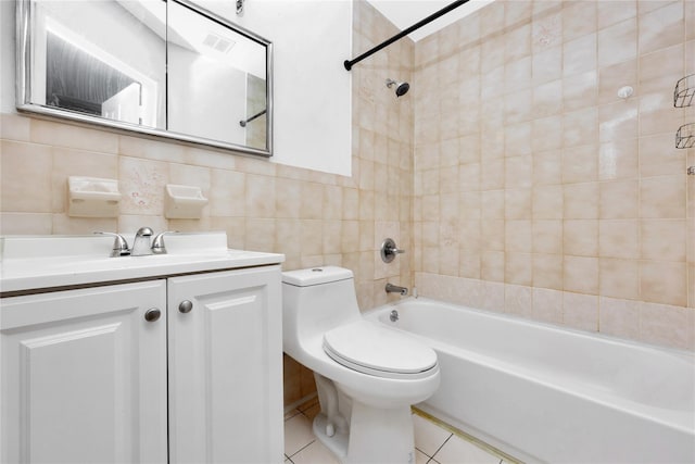 41-23 76th St # 2B, Elmhurst, NY 11373 - full bath featuring vanity, shower / bath combination, tile walls, and tile patterned floors