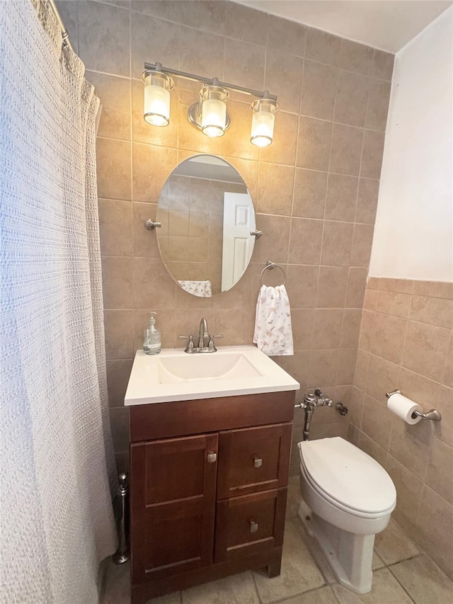 1475 Thieriot Ave Unit 6E, Bronx, NY 10460 - bathroom with tile walls, tile patterned floors, toilet, vanity, and a shower with shower curtain