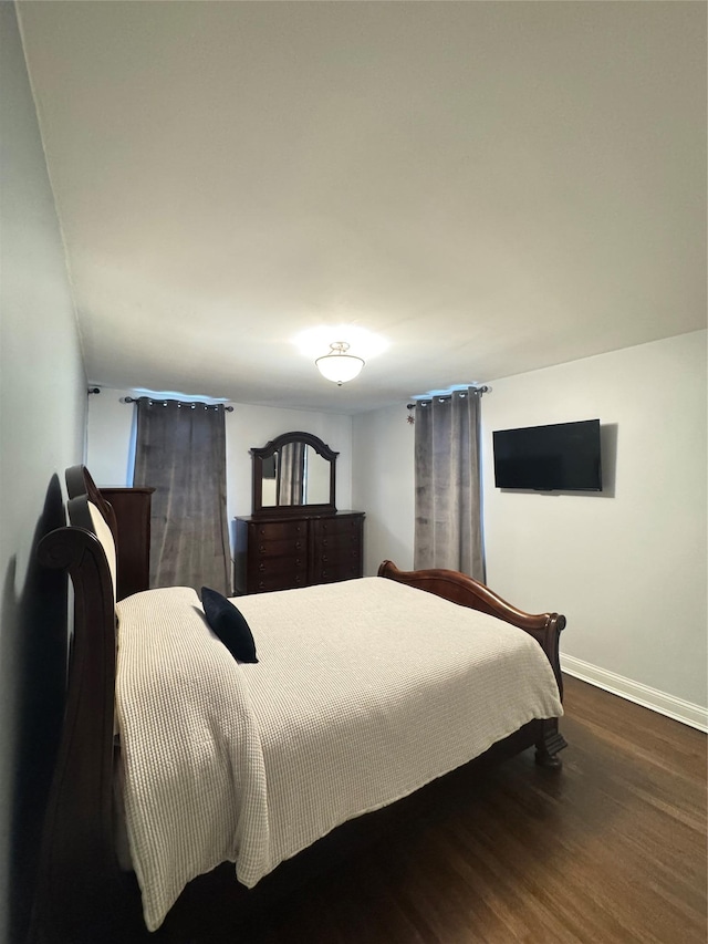 1475 Thieriot Ave Unit 6E, Bronx, NY 10460 - bedroom featuring baseboards and wood finished floors