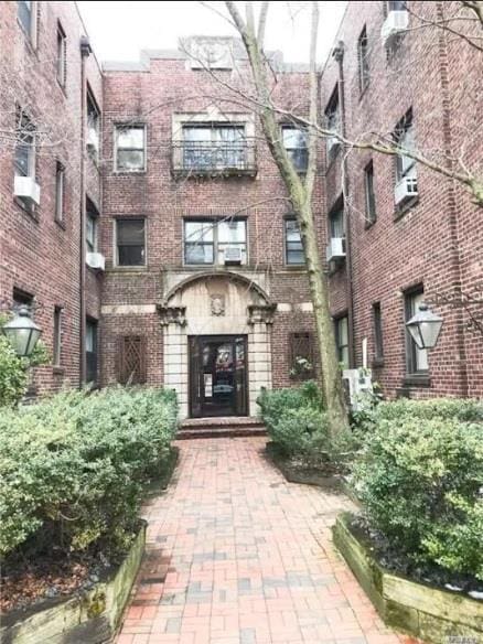 7 Bond St Unit 2C, Great Neck, NY 11021 - property entrance with brick siding