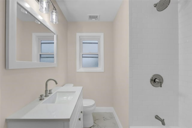 bathroom with vanity, visible vents, toilet, marble finish floor, and baseboards