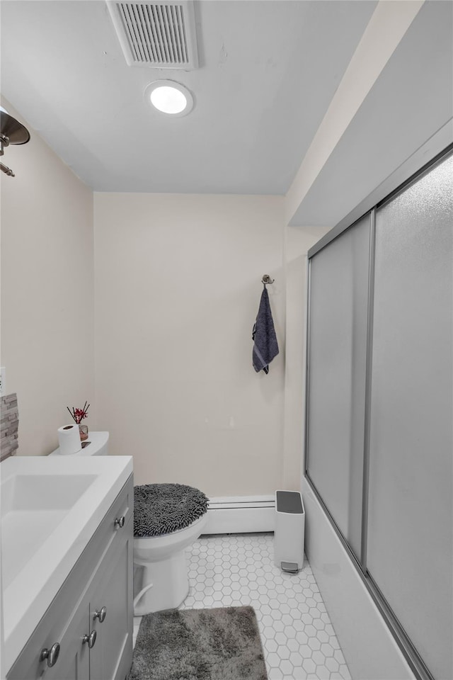 full bathroom with visible vents, a baseboard heating unit, enclosed tub / shower combo, toilet, and vanity