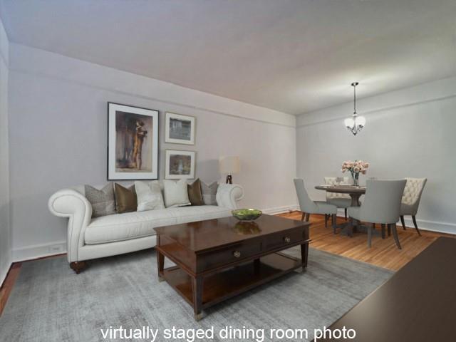 4 Dartmouth St Unit 24, Forest Hills, NY 11375 - living room with wood finished floors and baseboards