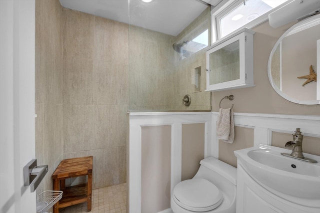 full bath featuring walk in shower, toilet, and vanity