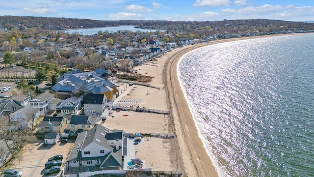 birds eye view of property featuring a water view and a residential view