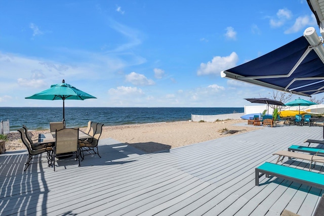 20 Greenwich Ave, Bayville, NY 11709 - deck with outdoor dining space and view of water and beach
