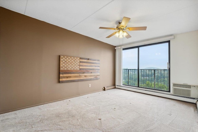 150 Overlook Ave Unit 8V, Peekskill, NY 10566 - spare room featuring a baseboard heating unit, carpet flooring, ceiling fan, baseboards, and a wall mounted AC