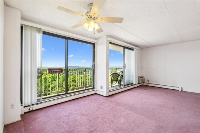 150 Overlook Ave Unit 8V, Peekskill, NY 10566 - carpeted spare room with plenty of natural light and ceiling fan