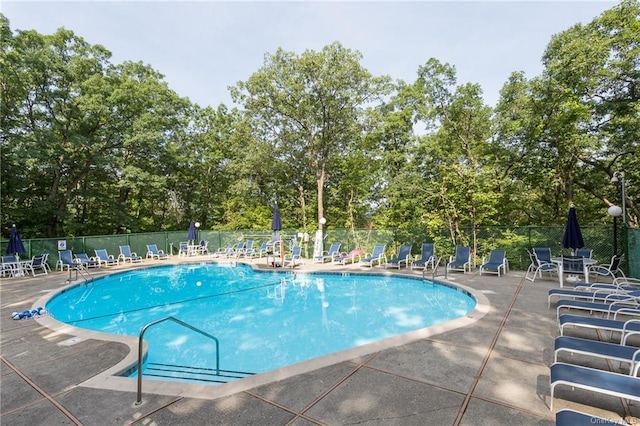 150 Overlook Ave Unit 8V, Peekskill, NY 10566 - community pool featuring a patio and view of scattered trees