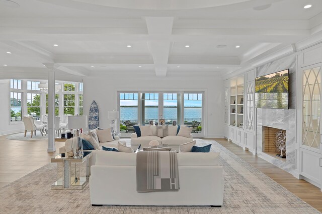 25 Brewster Ln, East Setauket, NY 11733 - living area featuring ornate columns, light wood-style floors, coffered ceiling, recessed lighting, and beamed ceiling