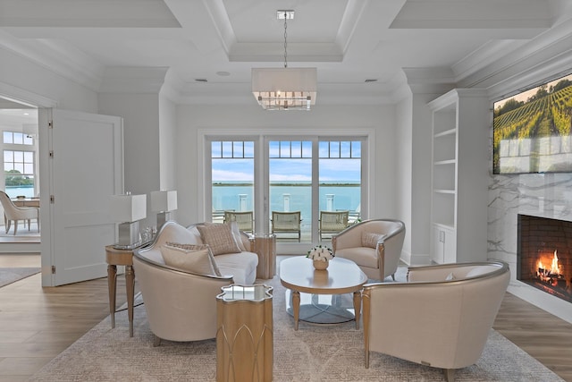 25 Brewster Ln, East Setauket, NY 11733 - living room with plenty of natural light, wood finished floors, coffered ceiling, a chandelier, and ornamental molding