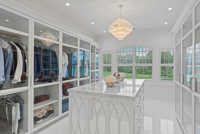 25 Brewster Ln, East Setauket, NY 11733 - sunroom / solarium featuring tile patterned flooring, a chandelier, healthy amount of natural light, ornamental molding, and recessed lighting