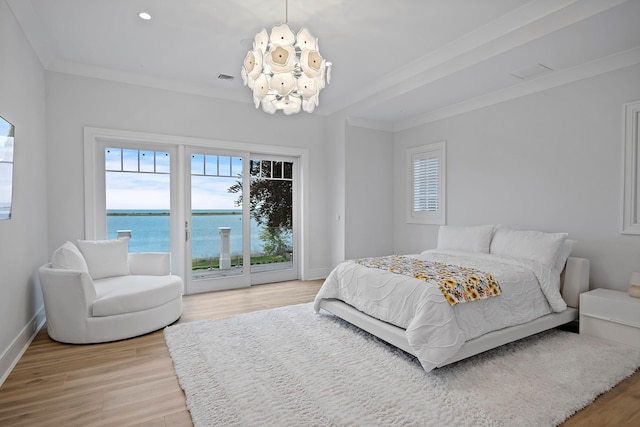 25 Brewster Ln, East Setauket, NY 11733 - bedroom with access to exterior, light wood-style flooring, baseboards, a chandelier, and crown molding