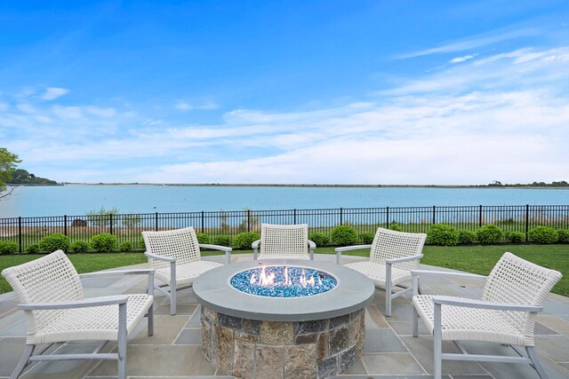 25 Brewster Ln, East Setauket, NY 11733 - view of patio / terrace with an outdoor fire pit and a water view