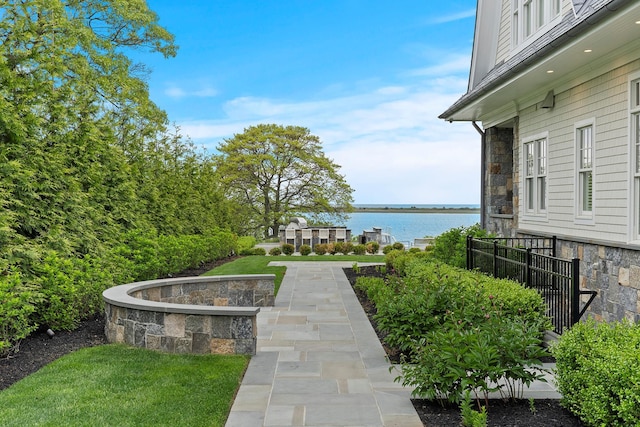 25 Brewster Ln, East Setauket, NY 11733 - view of patio / terrace featuring a water view
