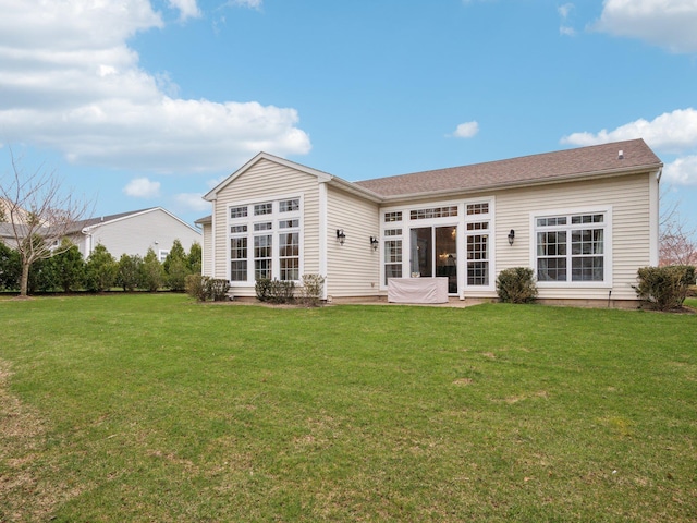 5 Hamlet Woods Dr, Saint James, NY 11780 - back of property featuring a yard and a patio area