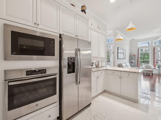 5 Hamlet Woods Dr, Saint James, NY 11780 - kitchen with a peninsula, white cabinets, appliances with stainless steel finishes, marble finish floor, and light stone counters