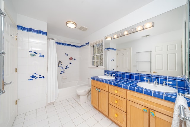 full bathroom with visible vents, tile patterned flooring, and a sink