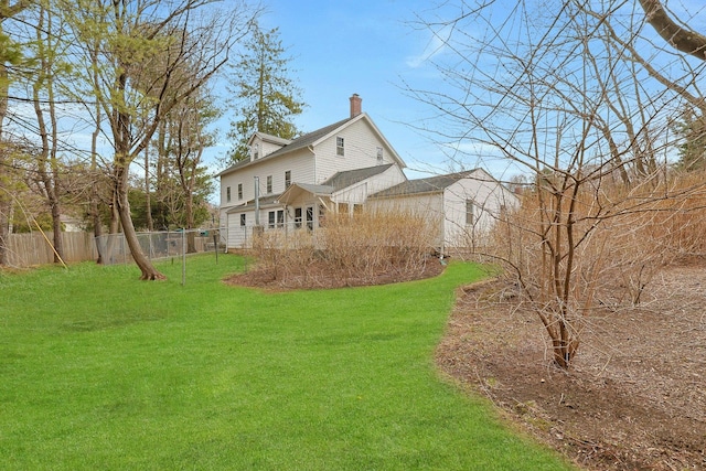 view of yard featuring fence