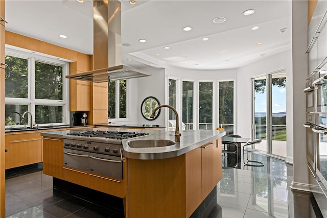 kitchen featuring island range hood, a kitchen island with sink, modern cabinets, stainless steel counters, and recessed lighting