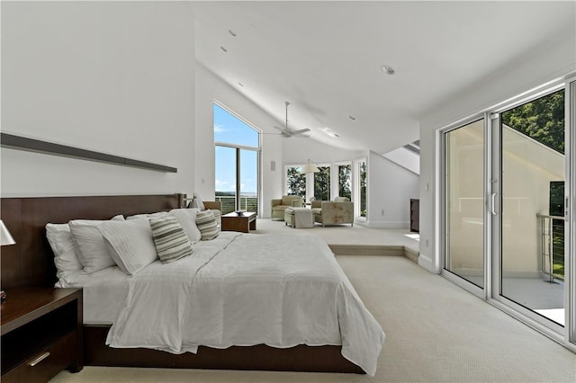 bedroom featuring multiple windows, carpet floors, high vaulted ceiling, and access to outside