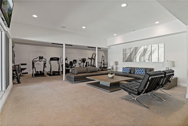 carpeted living room featuring recessed lighting