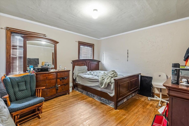 232 Courthouse Rd, Franklin Square, NY 11010 - bedroom featuring light wood-style floors and crown molding