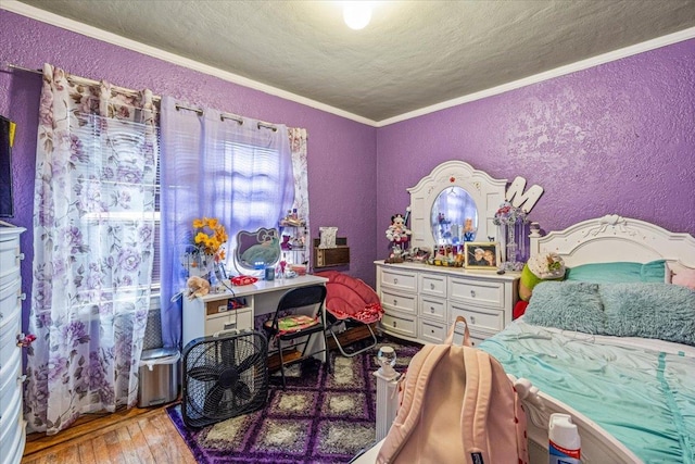 232 Courthouse Rd, Franklin Square, NY 11010 - bedroom featuring hardwood / wood-style flooring, a textured ceiling, ornamental molding, and a textured wall