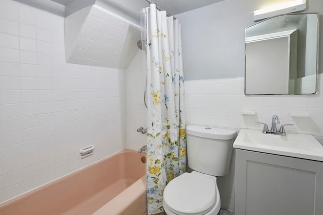 full bathroom featuring tile walls, toilet, vanity, and shower / bath combination with curtain