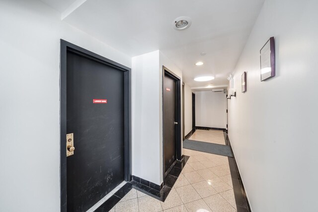 49-07 43rd Ave Unit 7F, Sunnyside, NY 11377 - corridor with granite finish floor, baseboards, and recessed lighting