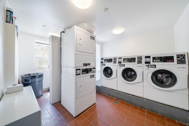 49-07 43rd Ave Unit 7F, Sunnyside, NY 11377 - community laundry room featuring dark tile patterned flooring and stacked washer / dryer