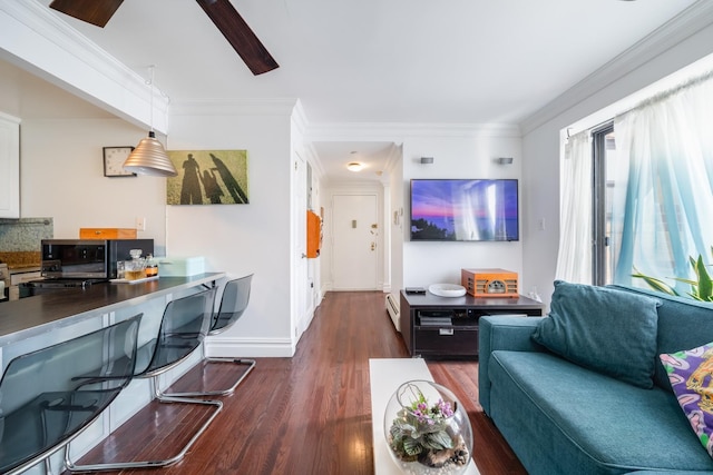 49-07 43rd Ave Unit 7F, Sunnyside, NY 11377 - living room with baseboards, wood finished floors, and crown molding