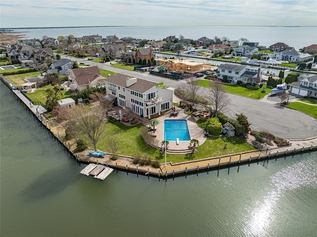 aerial view featuring a residential view and a water view