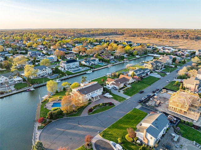 aerial view with a water view and a residential view