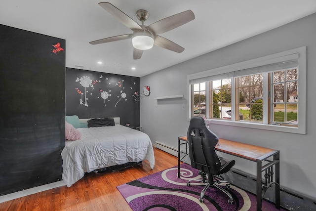 bedroom with recessed lighting, wood finished floors, and a ceiling fan