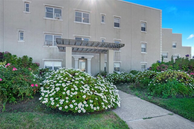 view of property with cooling unit