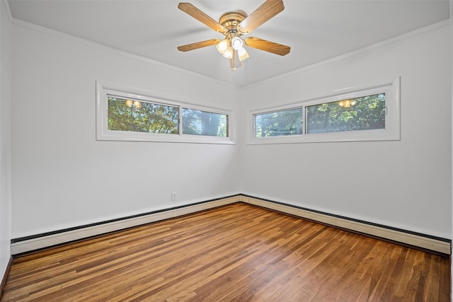 empty room featuring a ceiling fan, wood finished floors, and ornamental molding