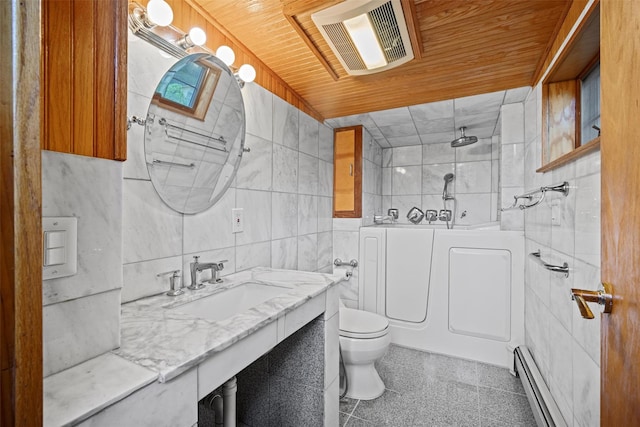 full bath featuring visible vents, toilet, wood ceiling, a baseboard heating unit, and tile walls