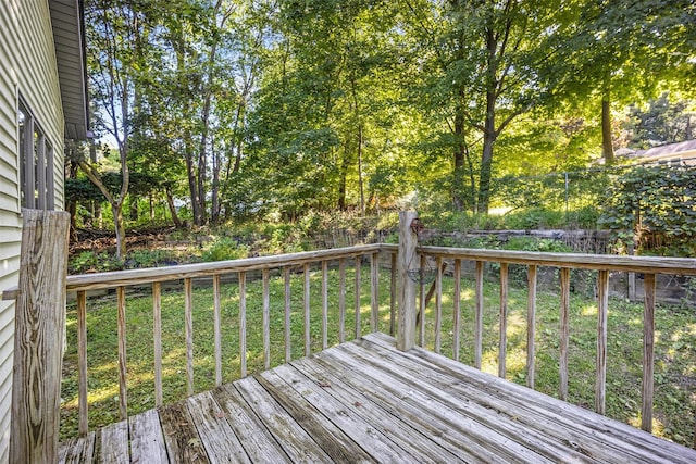 deck featuring a lawn
