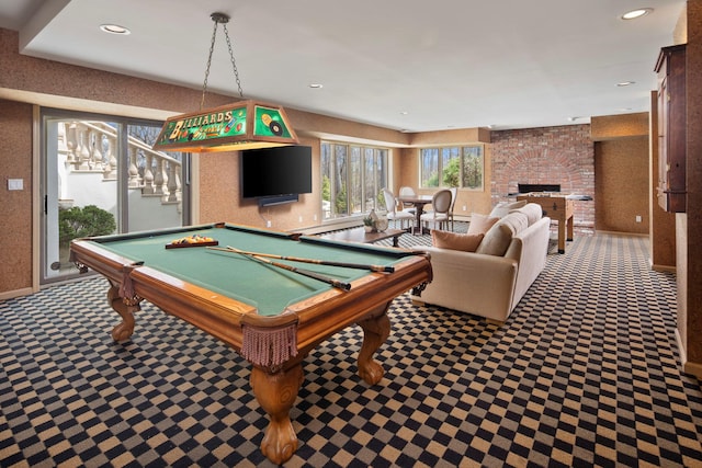 playroom featuring billiards, a brick fireplace, and tile patterned floors